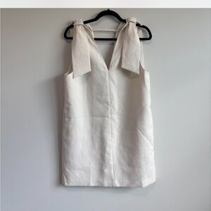 Elegant Cream Sleeveless Dress with Bow Straps